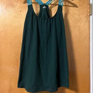 Kavu tank top with shelf bra. Longer shirt, hits below the hips. Never worn.